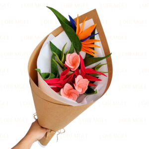 Tropics bouquet. birds of paradise, frangipani and heliconia flowers.